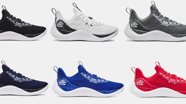 Side view of six pairs of Stephen Curry's Under Armour shoes.